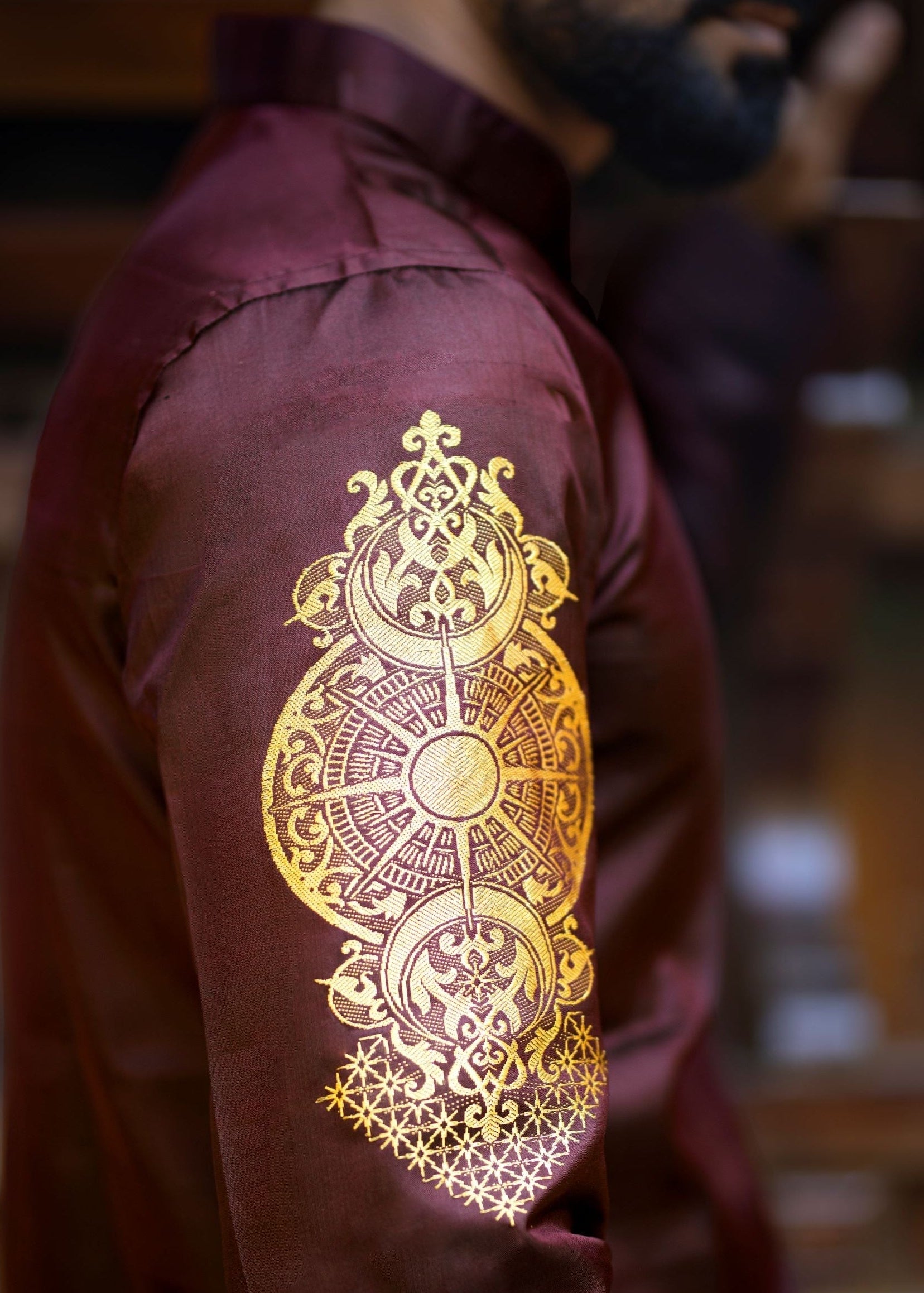 Capricorn zodiac embroidered silk kurta handloom maroon Mulberry silk kurta with golden zari Mughal style handloom silk kurta with German golden zari closeup side view